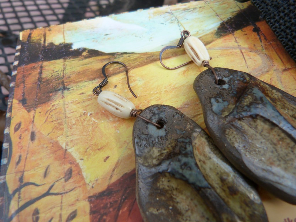 clay earwear with bone